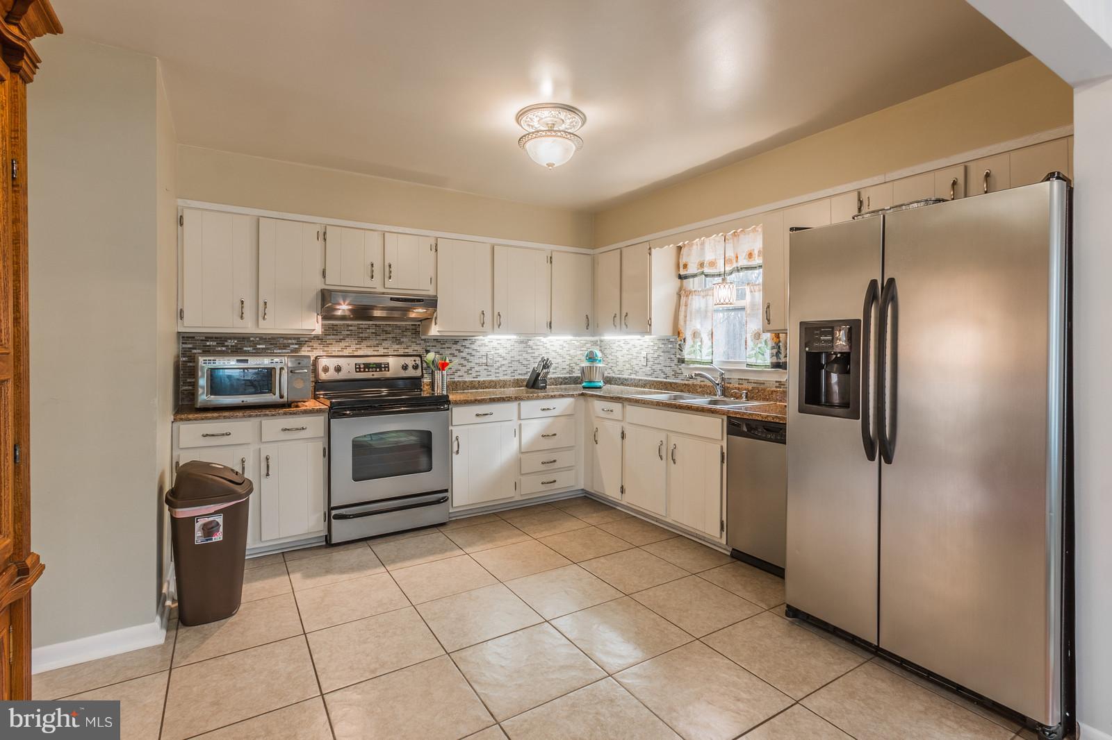 491 Cropp Road Fredericksburg, VA 22406 - Photo 7 of 30 Kitchen with views of backyard and woods