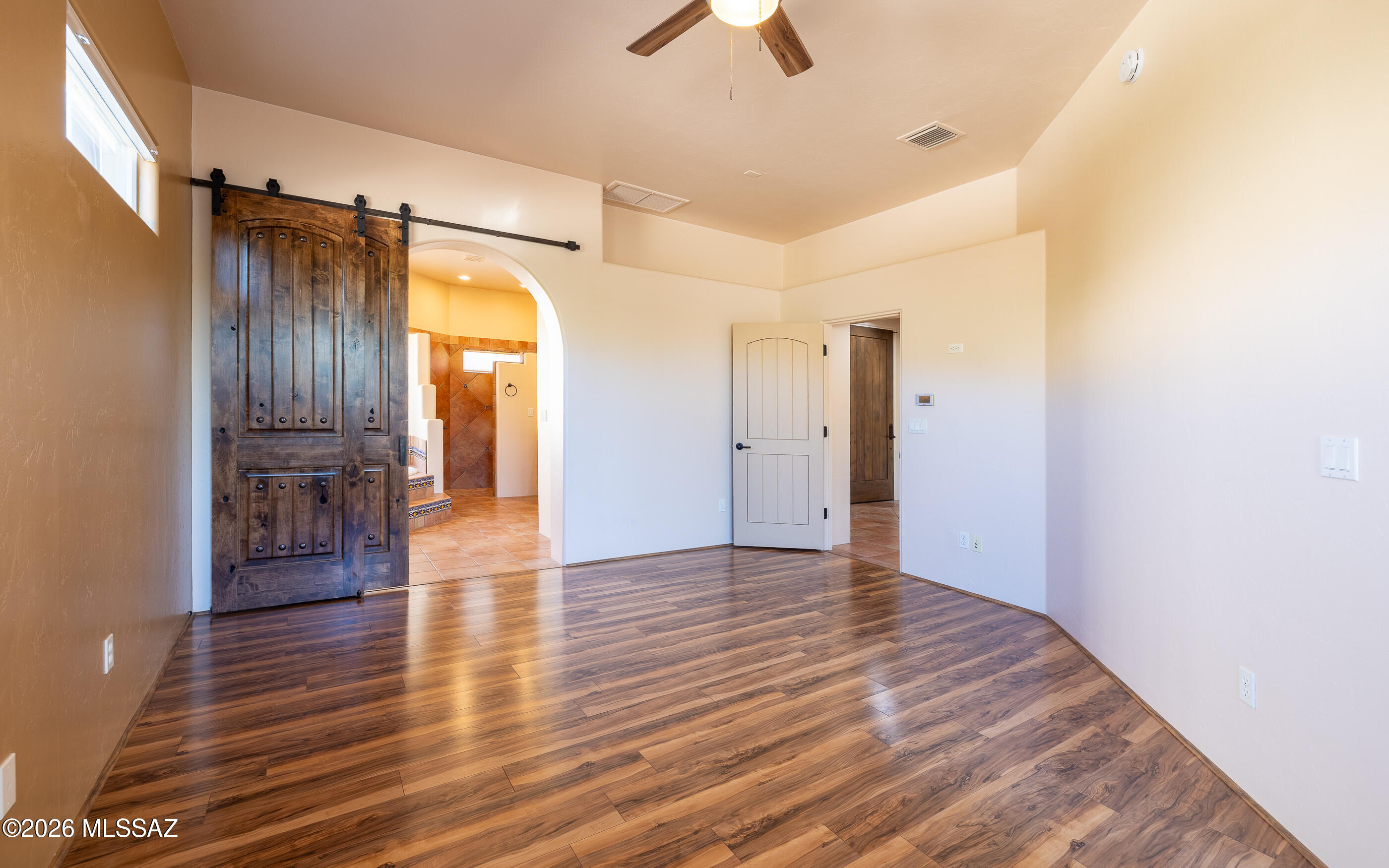 5550 West Open R Place Tucson, AZ 85713 - Photo 25 of 48 Another look at the owner's suite. This home has NO carpet!