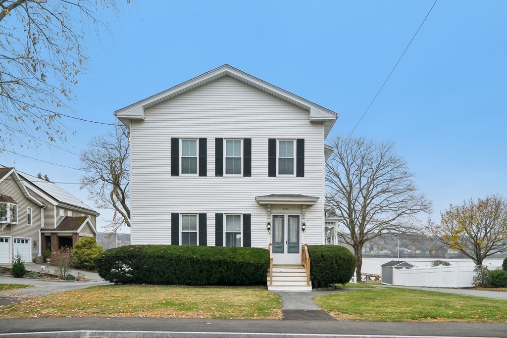 2396 Riverside Avenue Somerset, MA 02726 - Photo 12 of 42 a view of a yard in front of a house