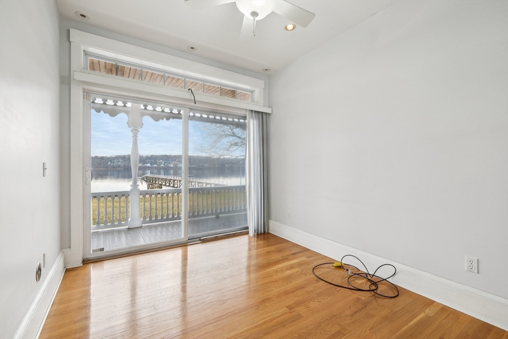 2396 Riverside Avenue Somerset, MA 02726 - Photo 18 of 42 a view of a room with wooden floor and windows