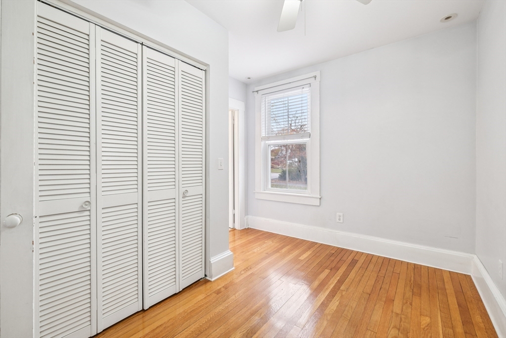 2396 Riverside Avenue Somerset, MA 02726 - Photo 27 of 42 a view of a room with wooden floor and a window