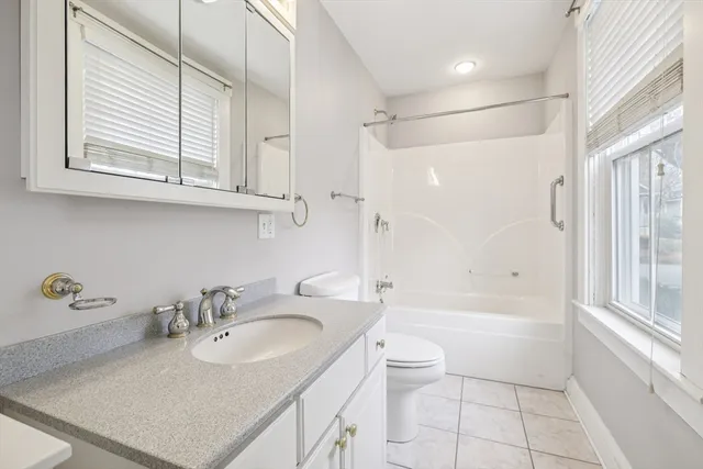 an empty room with a empty space and a window