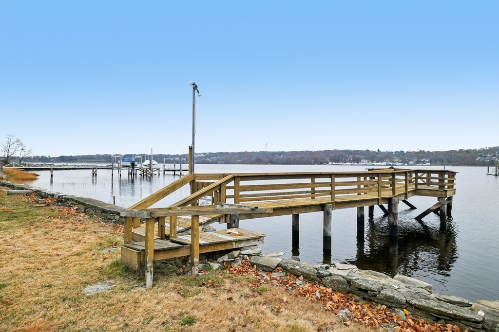 2396 Riverside Avenue Somerset, MA 02726 - Photo 3 of 42 a view of a swimming pool with outdoor seating space