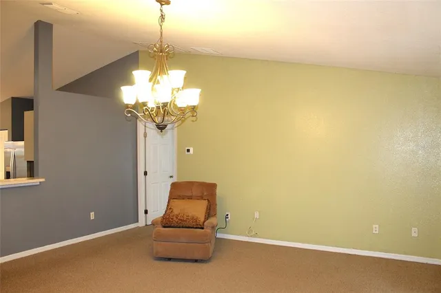 a vase of flowers sitting on a table