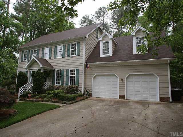 8417 Morgans Way Raleigh, NC 27613 - Photo 1 of 1 a front view of a house with a yard and garage