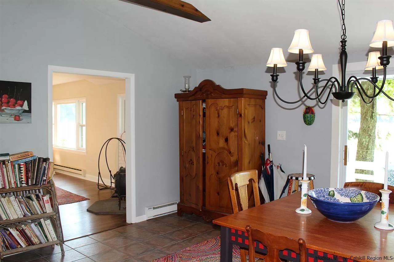 379 Tanglewood Lane Road Delhi, NY 13752 - Photo 15 of 35 a living room with furniture and a window
