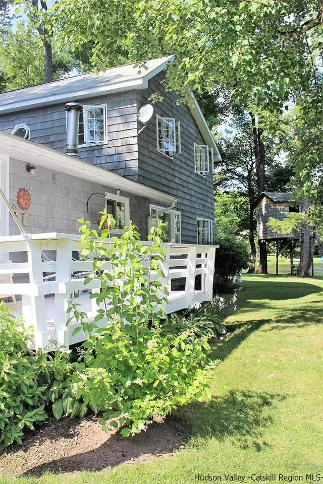 379 Tanglewood Lane Road Delhi, NY 13752 - Photo 16 of 35 a aerial view of a house with a yard
