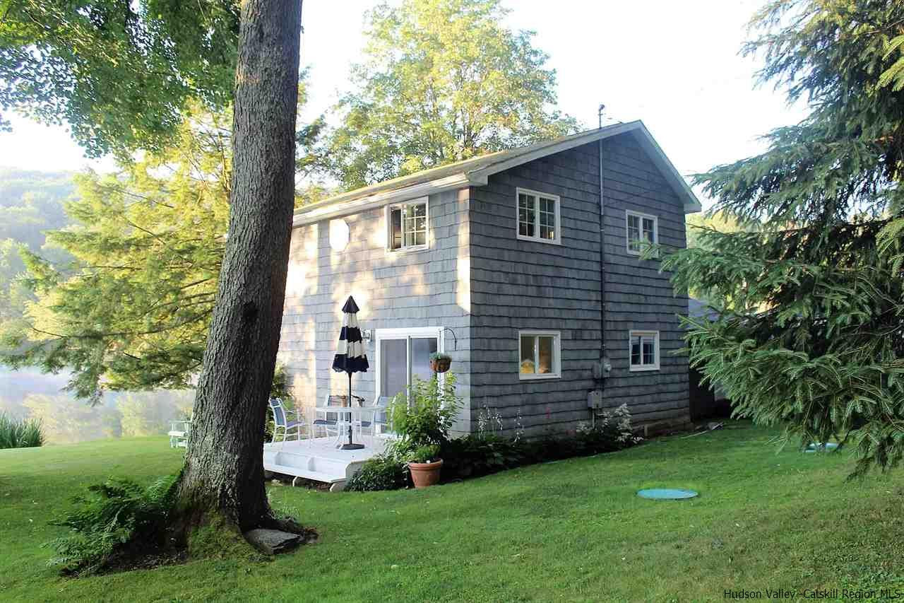 379 Tanglewood Lane Road Delhi, NY 13752 - Photo 28 of 35 a view of a house with a yard