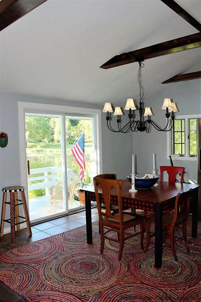 379 Tanglewood Lane Road Delhi, NY 13752 - Photo 31 of 35 a view of a dining room with furniture window and wooden floor