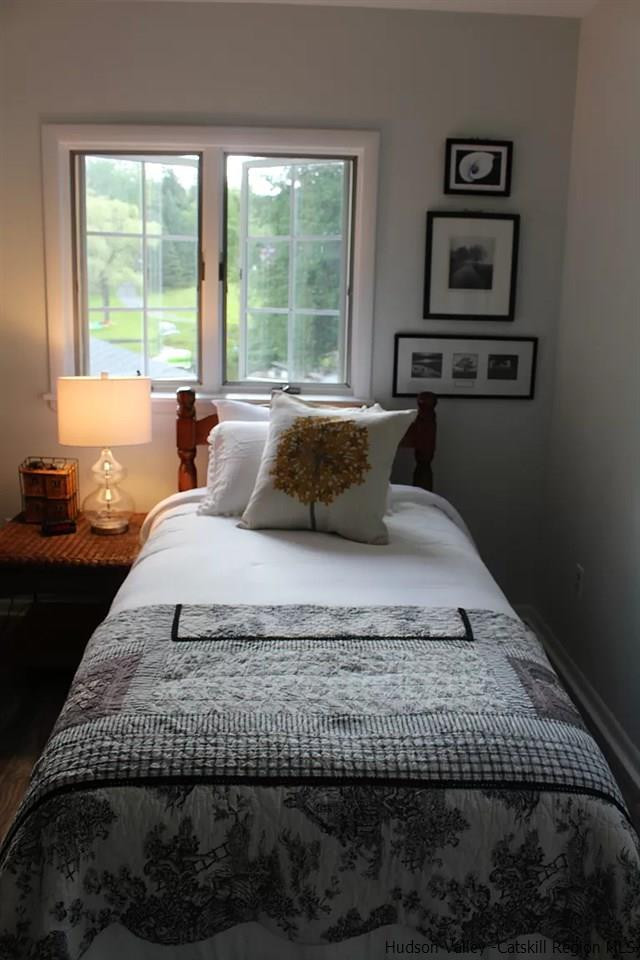 379 Tanglewood Lane Road Delhi, NY 13752 - Photo 33 of 35 a bedroom with a bed and a window