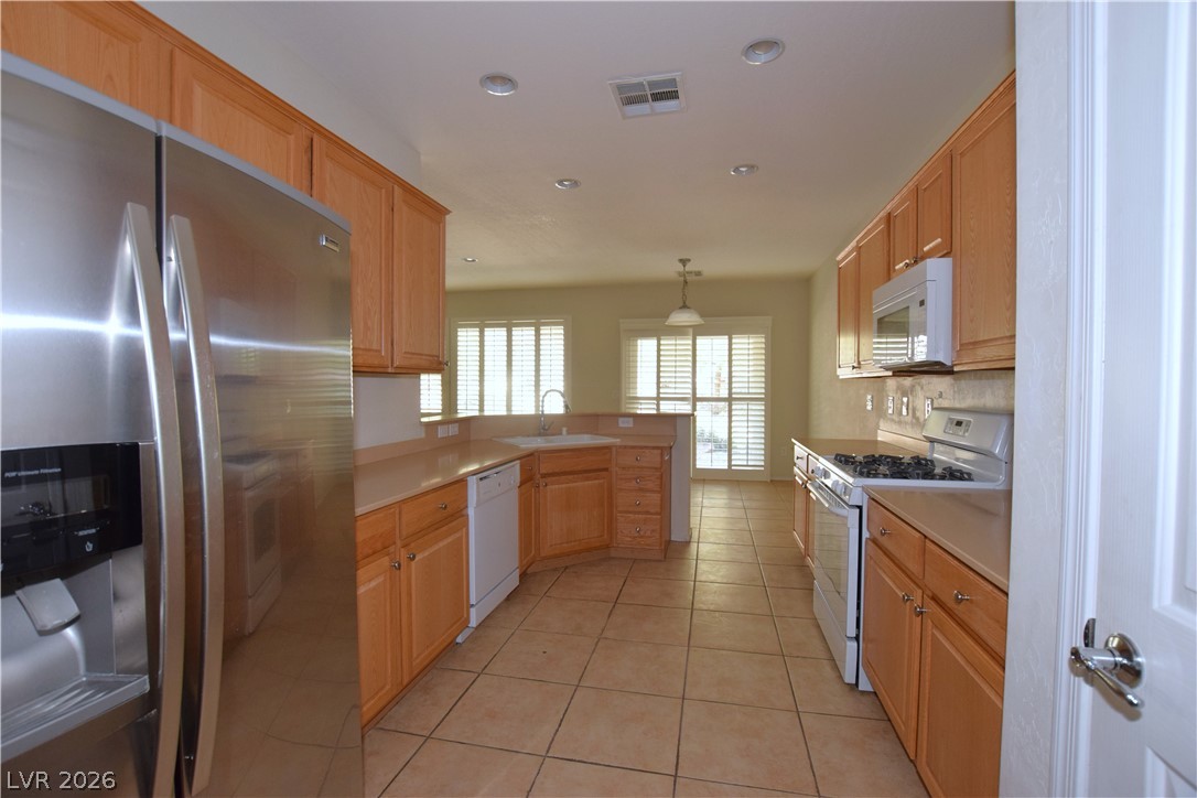 2452 Cosmic Ray Place Henderson, NV 89044 - Photo 15 of 51 fridge stays