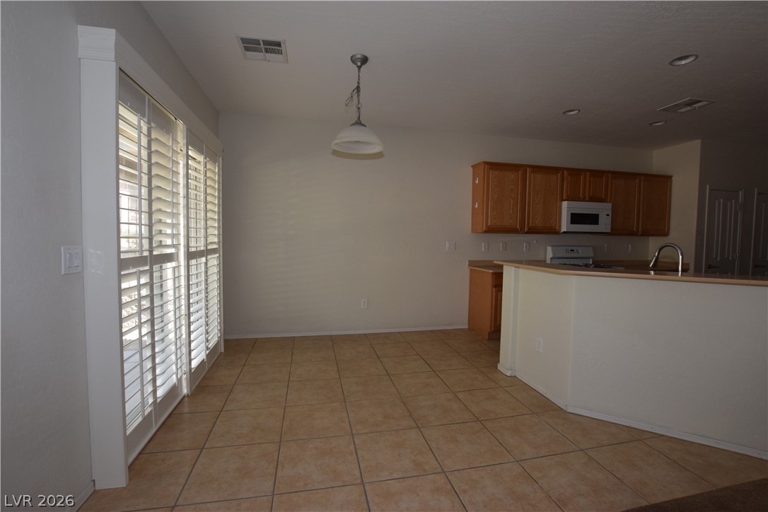 2452 Cosmic Ray Place Henderson, NV 89044 - Photo 20 of 51 nook and breakfast bar