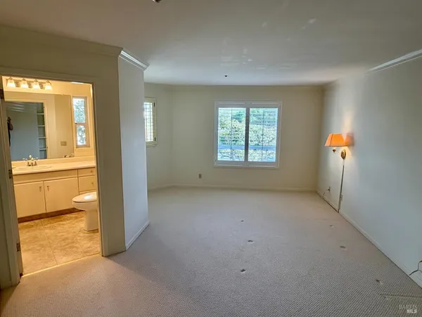 an empty room with windows