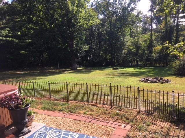549 Blue Ridge Drive Blue Ridge, VA 24064 - Photo 19 of 22 a view of a garden with a bench