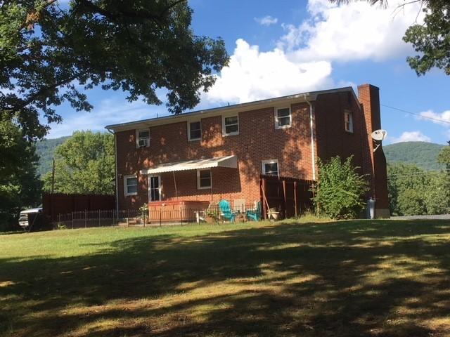 549 Blue Ridge Drive Blue Ridge, VA 24064 - Photo 22 of 22 a front view of house with yard