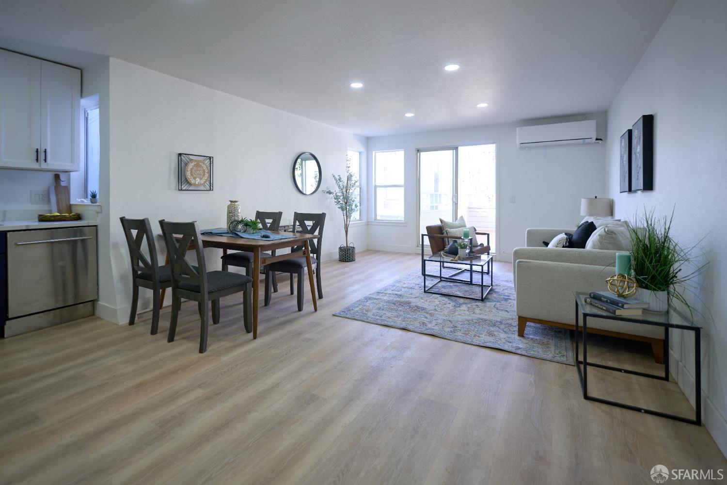 1270 South Van Ness Avenue, Unit A San Francisco, CA 94110 - Photo 7 of 28 a living room with furniture a window and wooden floor