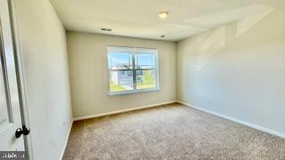 1236 Pimpernell Path Middletown, DE 19709 - Photo 21 of 37 an empty room with windows