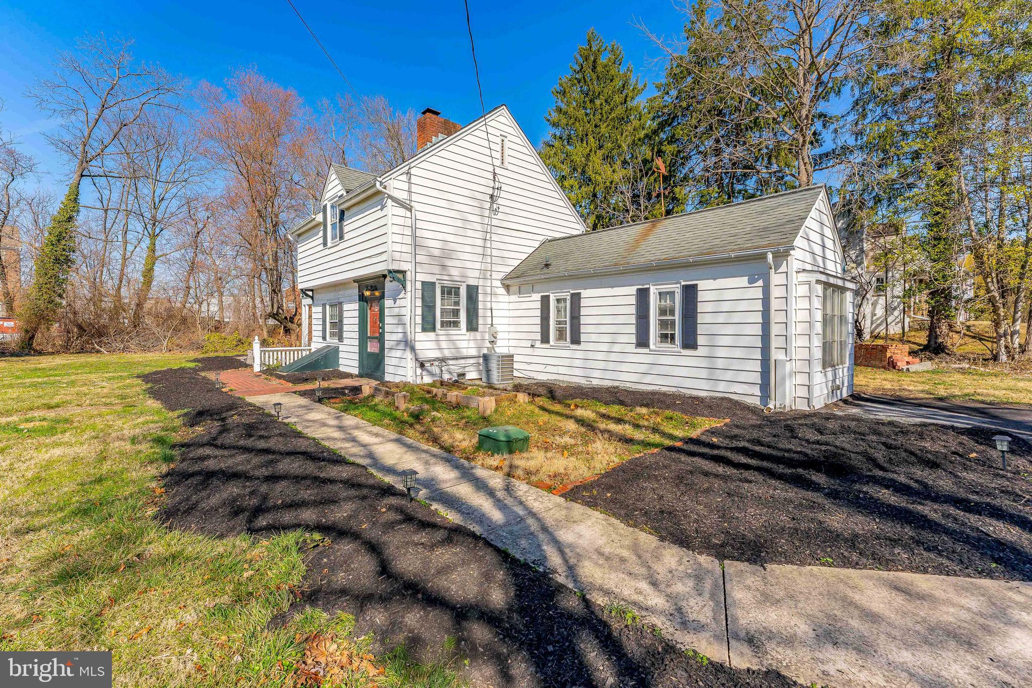 30 Meadowbrook Road Wayne, PA 19087 - Photo 3 of 37 a view of a house with pool and sitting area