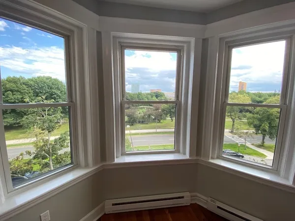 a view of a room that has a window