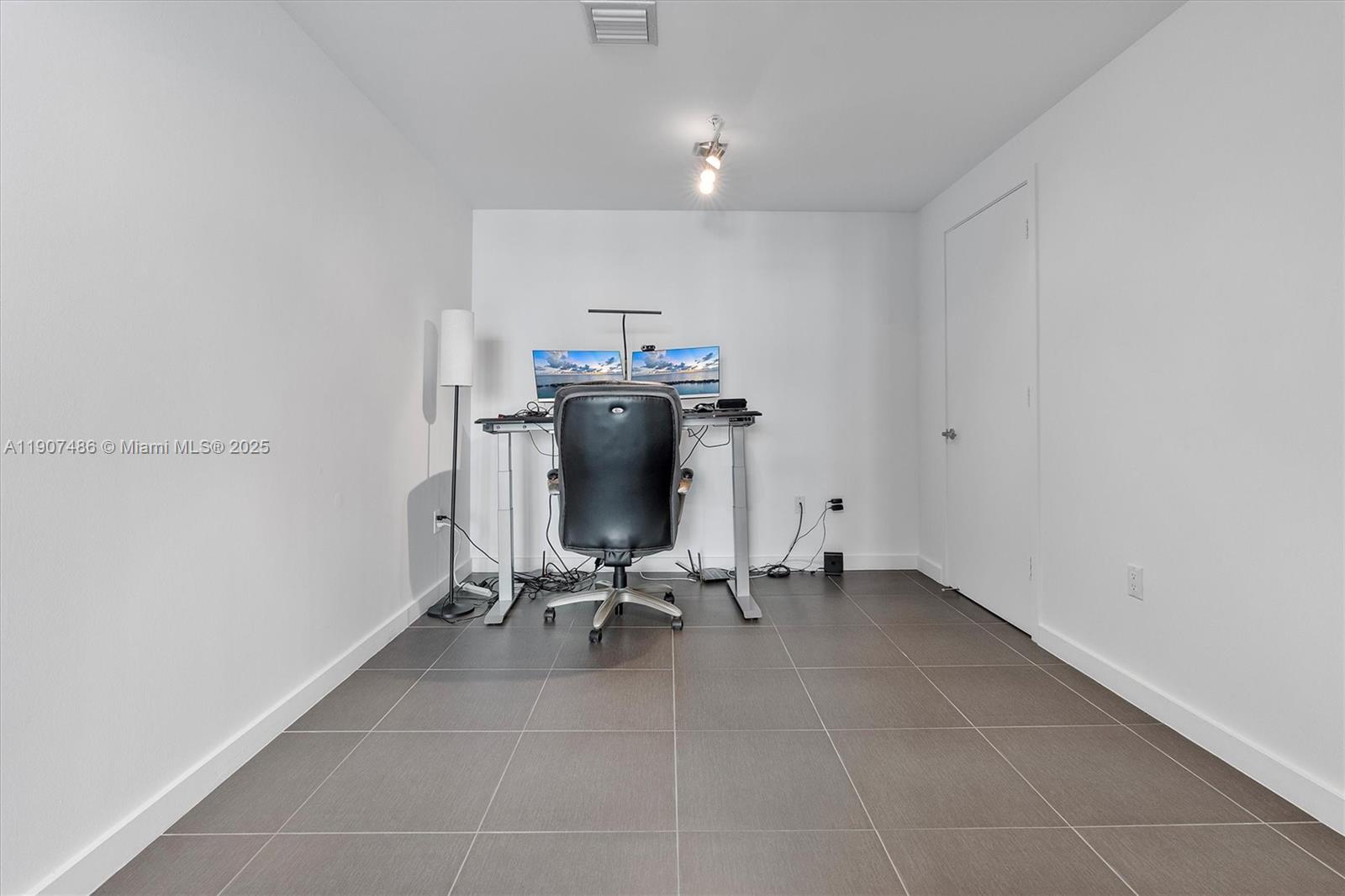 3301 Northeast 1st Avenue, Unit M0502 Miami, FL 33137 - Photo 16 of 29 a view of workspace with windows