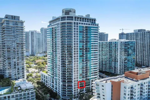 a view of a city with tall buildings