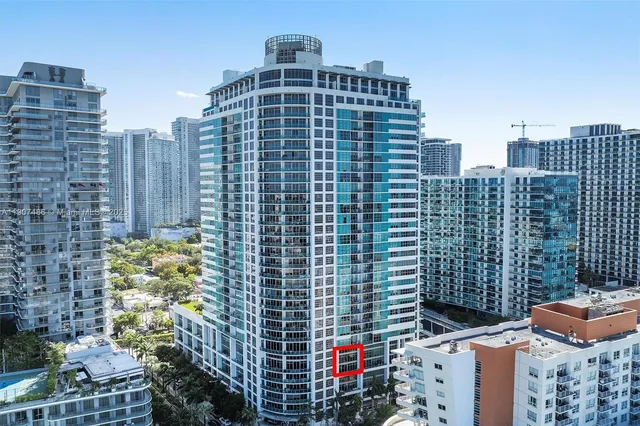 a view of a city with tall buildings