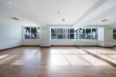 a view of kitchen with furniture and a potted plant