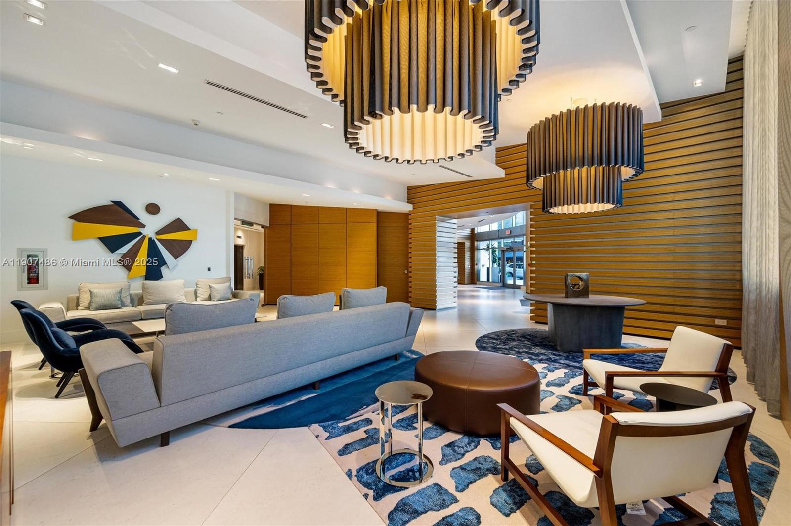 3301 Northeast 1st Avenue, Unit M0502 Miami, FL 33137 - Photo 23 of 29 a living room with furniture and a fireplace