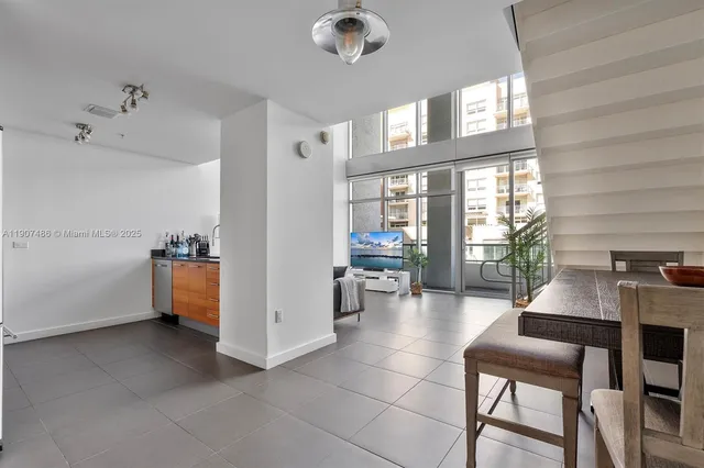 a room with furniture and a window