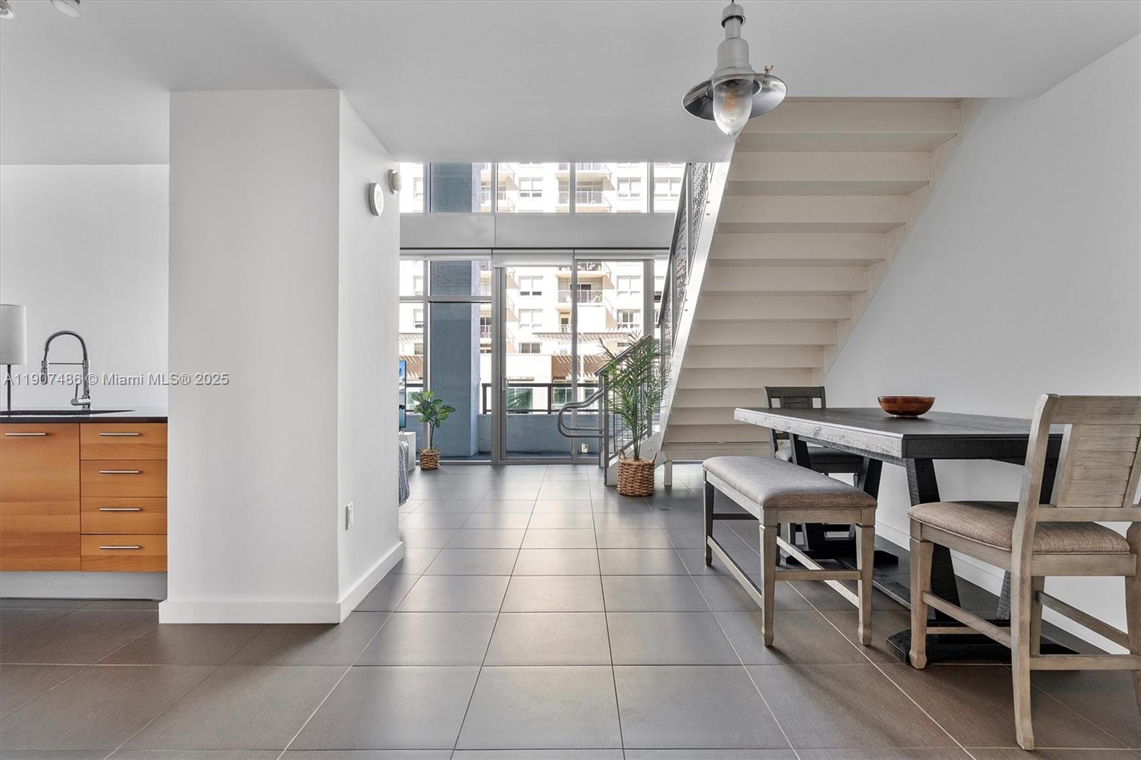 3301 Northeast 1st Avenue, Unit M0502 Miami, FL 33137 - Photo 8 of 29 a room with furniture and a window