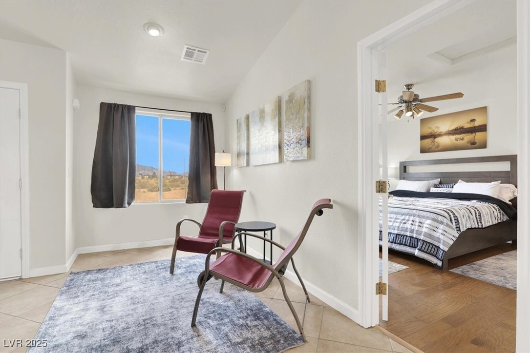 4391 Emma Street Pahrump, NV 89048 - Photo 14 of 28 Living area featuring light tile patterned floors