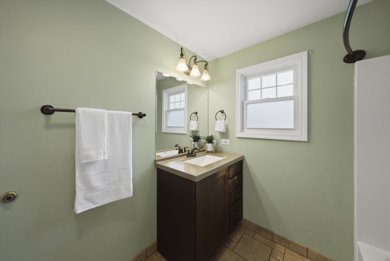 3719 211th Place Matteson, IL 60443 - Photo 22 of 48 a bathroom with a sink toilet and mirror