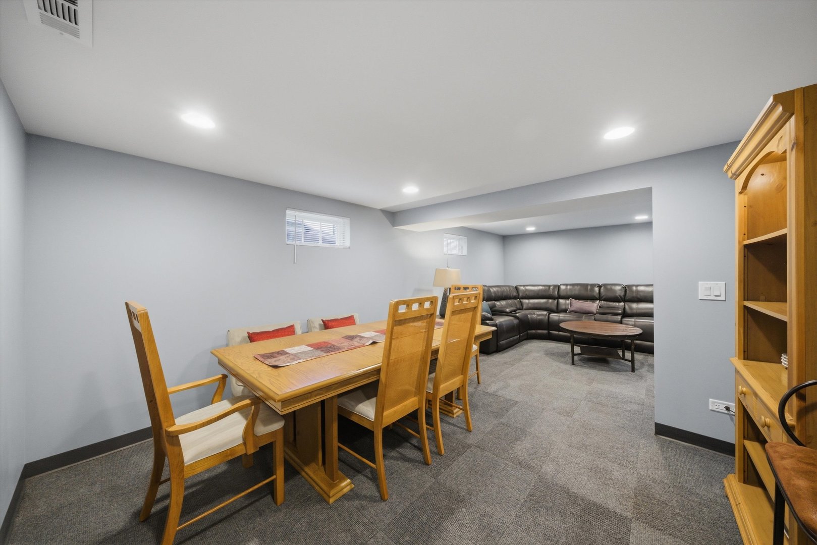 3719 211th Place Matteson, IL 60443 - Photo 24 of 48 a dining room with a wooden table and chairs