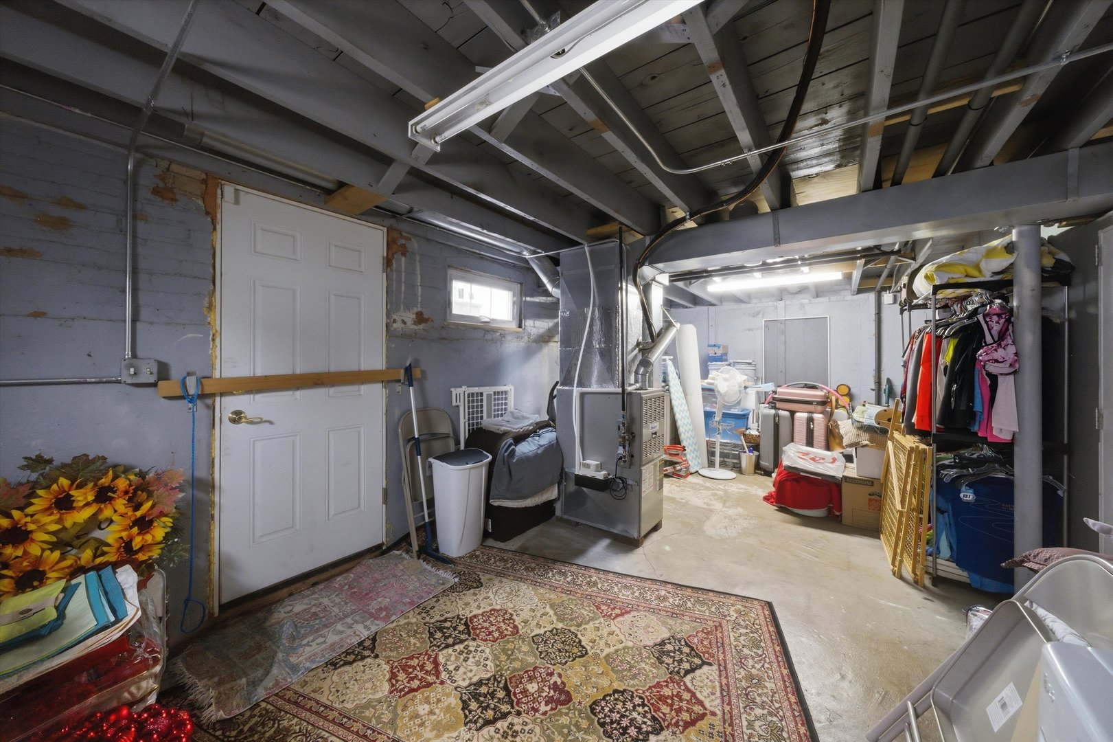 3719 211th Place Matteson, IL 60443 - Photo 30 of 48 a bed room with a bed and a walk in closet