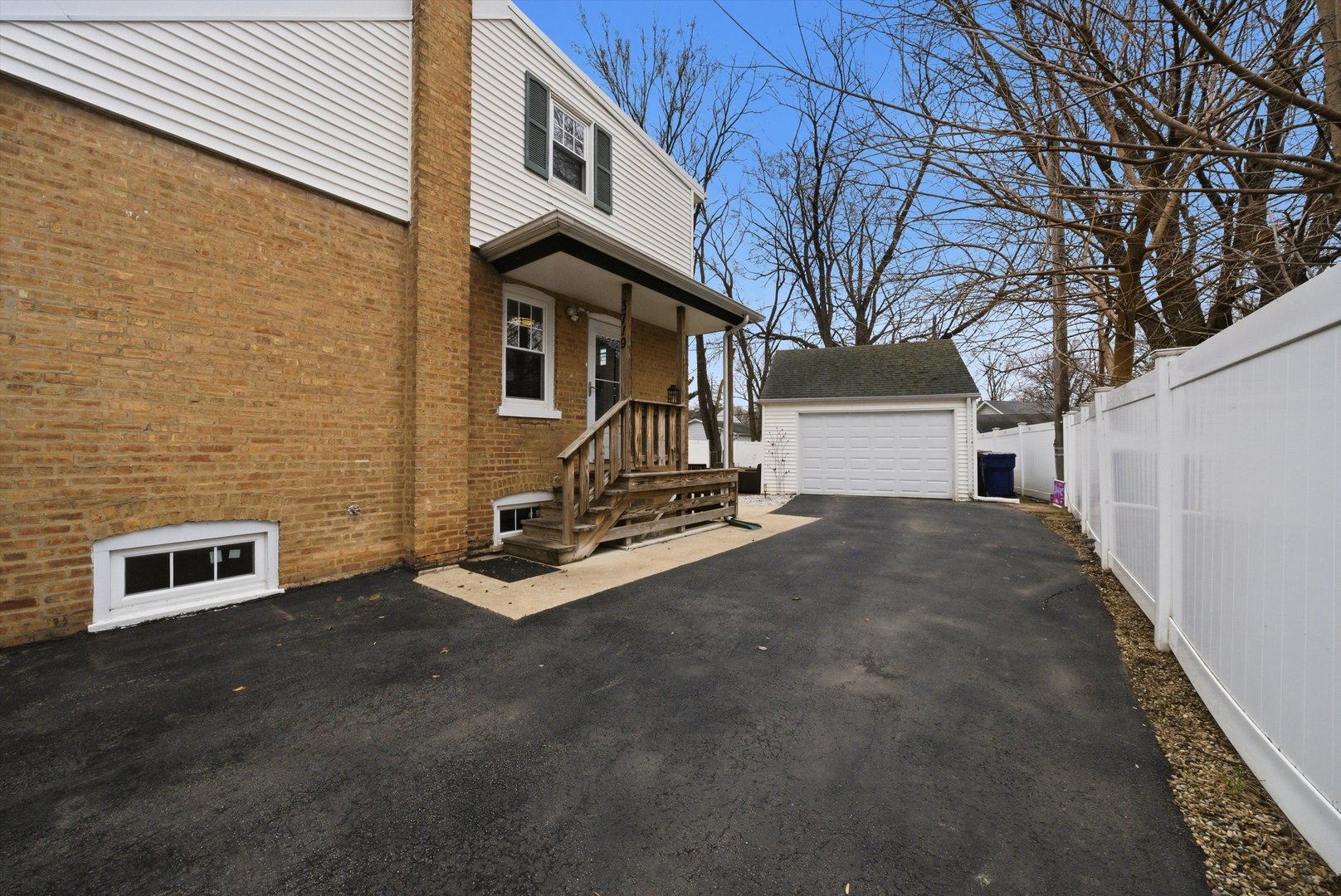 3719 211th Place Matteson, IL 60443 - Photo 32 of 48 a view of a house with a yard
