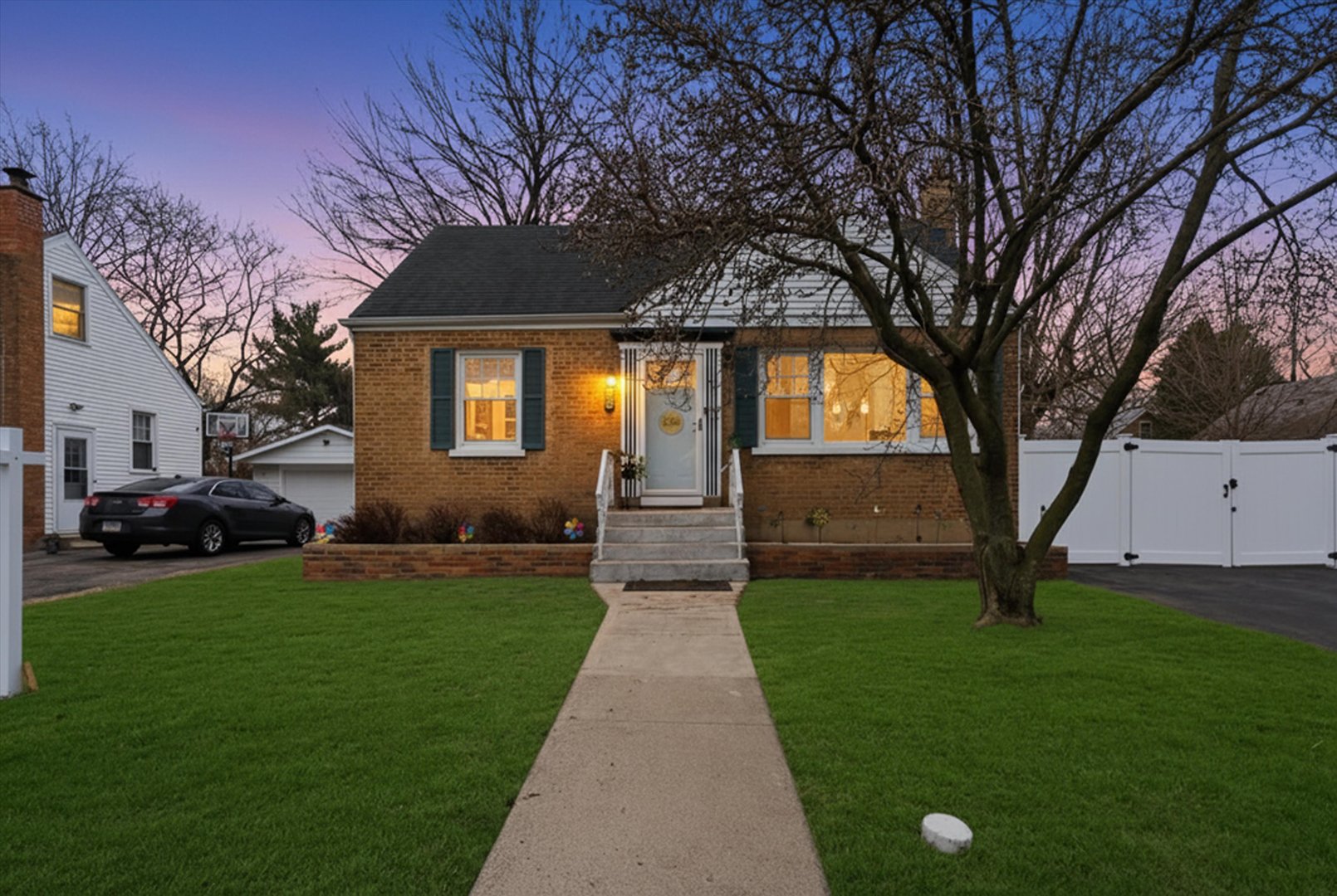3719 211th Place Matteson, IL 60443 - Photo 40 of 48 a front view of a house with garden