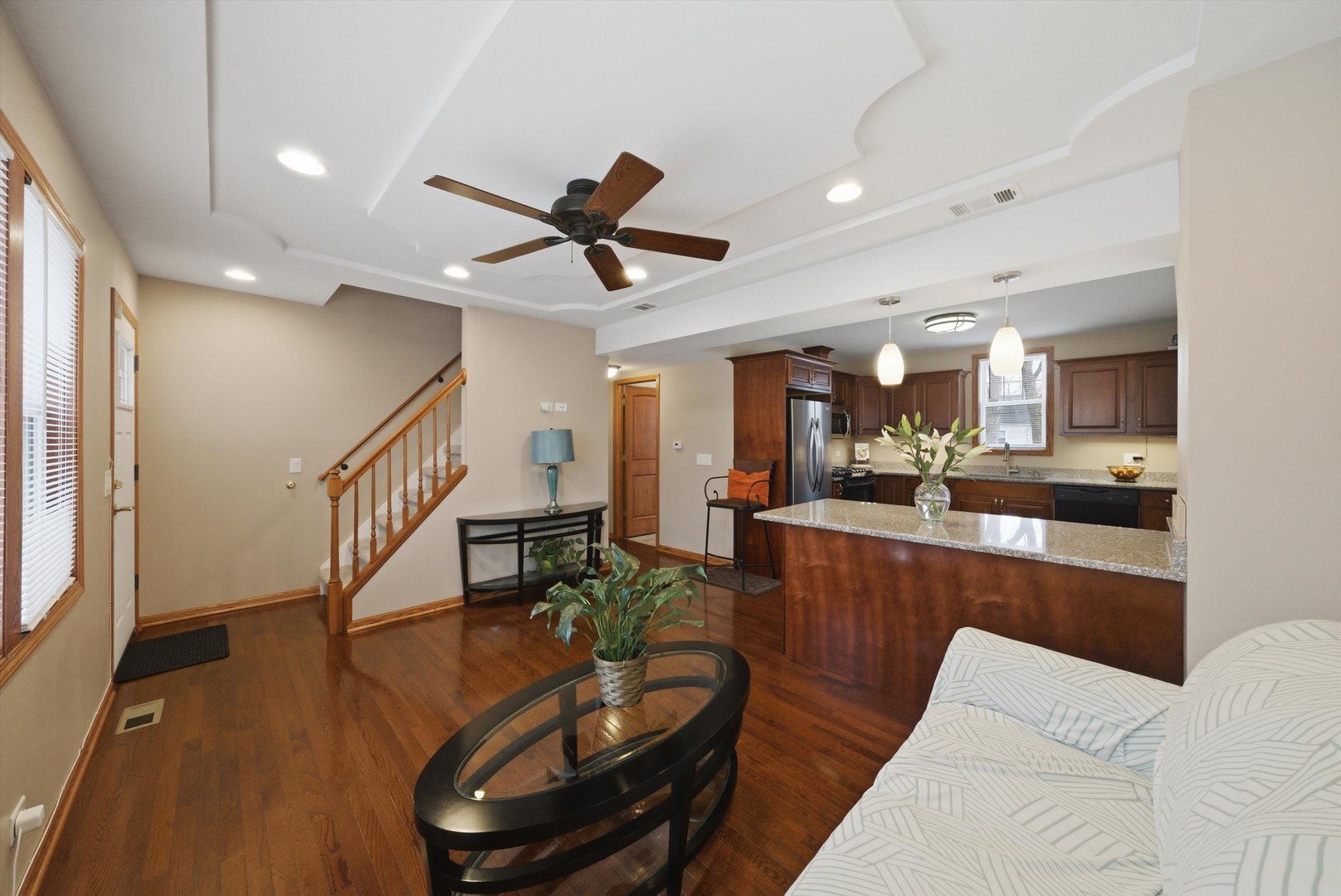 3719 211th Place Matteson, IL 60443 - Photo 7 of 48 a living room with furniture and a wooden floor
