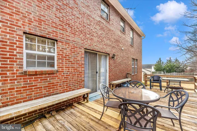 a view of a yard with snow in front of it