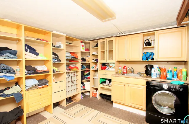 a storage room with washer and dryer