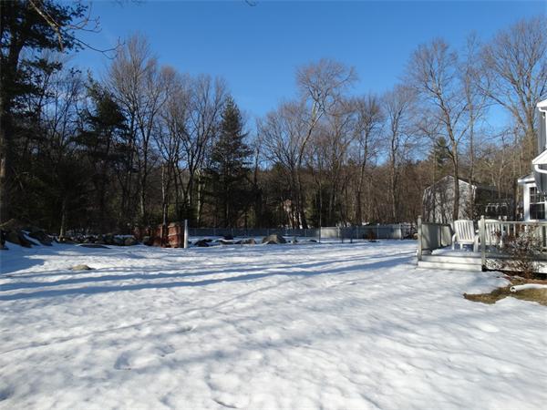25 Fox Hill Road Ashland, MA 01721 - Photo 3 of 23 a backyard of a house with trees and houses