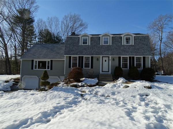 25 Fox Hill Road Ashland, MA 01721 - Photo 4 of 23 a front view of a house with a yard