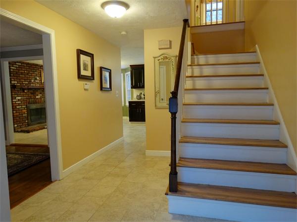 25 Fox Hill Road Ashland, MA 01721 - Photo 5 of 23 a view of entryway with wooden floor and stairs
