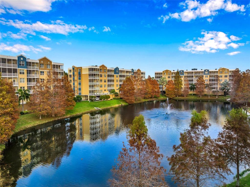 a view of a lake with a city