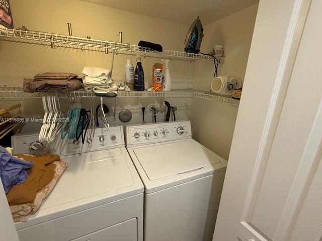 16420 Southwest 48th Terrace Miami, FL 33185 - Photo 19 of 58 a utility room with dryer and washer