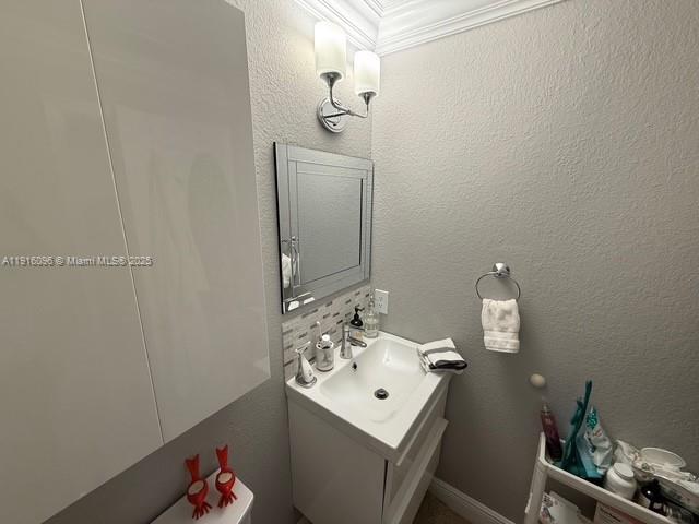 16420 Southwest 48th Terrace Miami, FL 33185 - Photo 22 of 59 a bathroom with a sink and a mirror