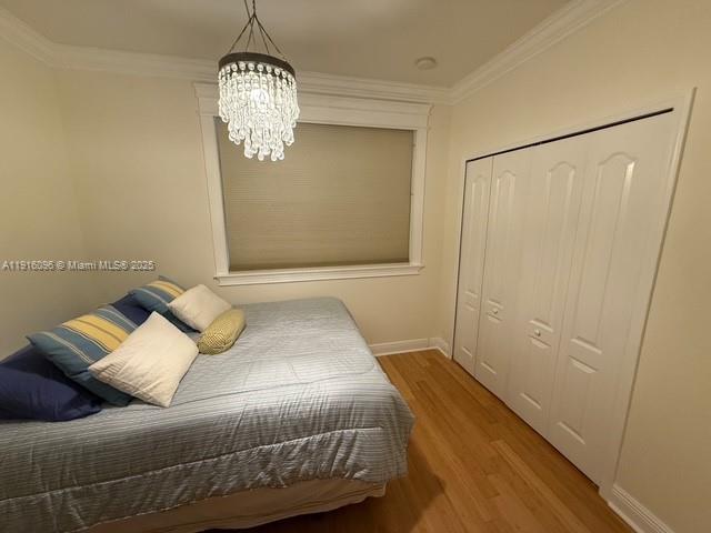16420 Southwest 48th Terrace Miami, FL 33185 - Photo 28 of 58 a bedroom with a bed and window