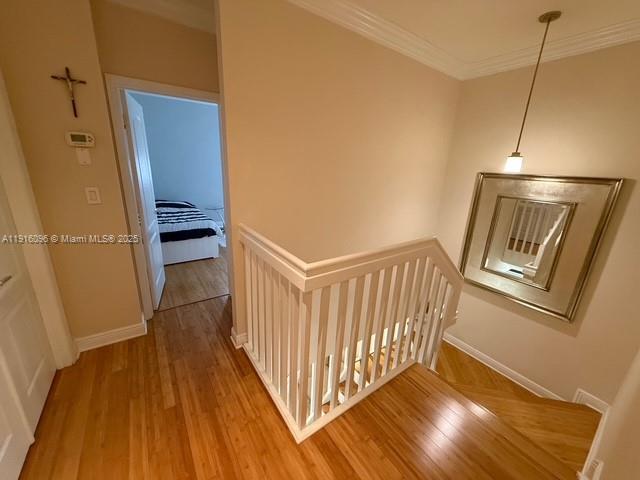 16420 Southwest 48th Terrace Miami, FL 33185 - Photo 29 of 58 a view of a hallway with wooden floor and staircase