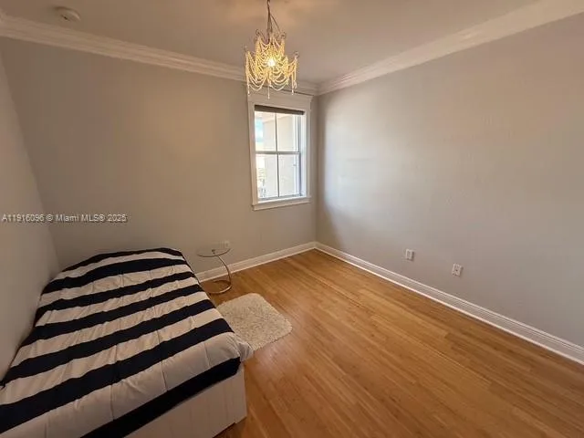 a bathroom with a sink a toilet and shower a mirror