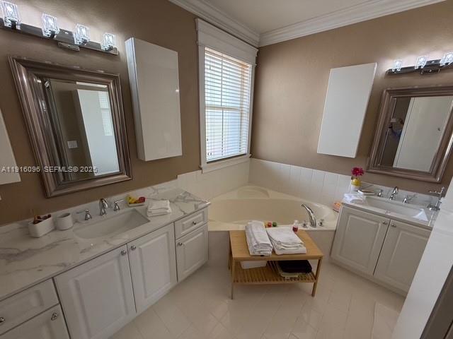 16420 Southwest 48th Terrace Miami, FL 33185 - Photo 38 of 59 a bathroom with a double vanity sink and a mirror