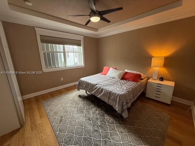 16420 Southwest 48th Terrace Miami, FL 33185 - Photo 43 of 58 a bedroom with a bed and a window